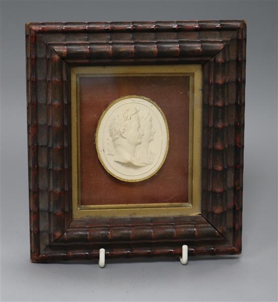 A Grand Tour plaster double portrait medallion, framed overall 16.5 x 15cm